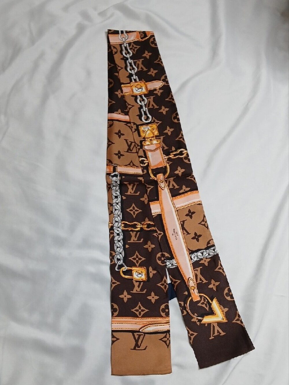 Louis Vuitton Brown & Tan Monogram Silk Twilly with Equestrian Chain Motif - Picture 2 of 3